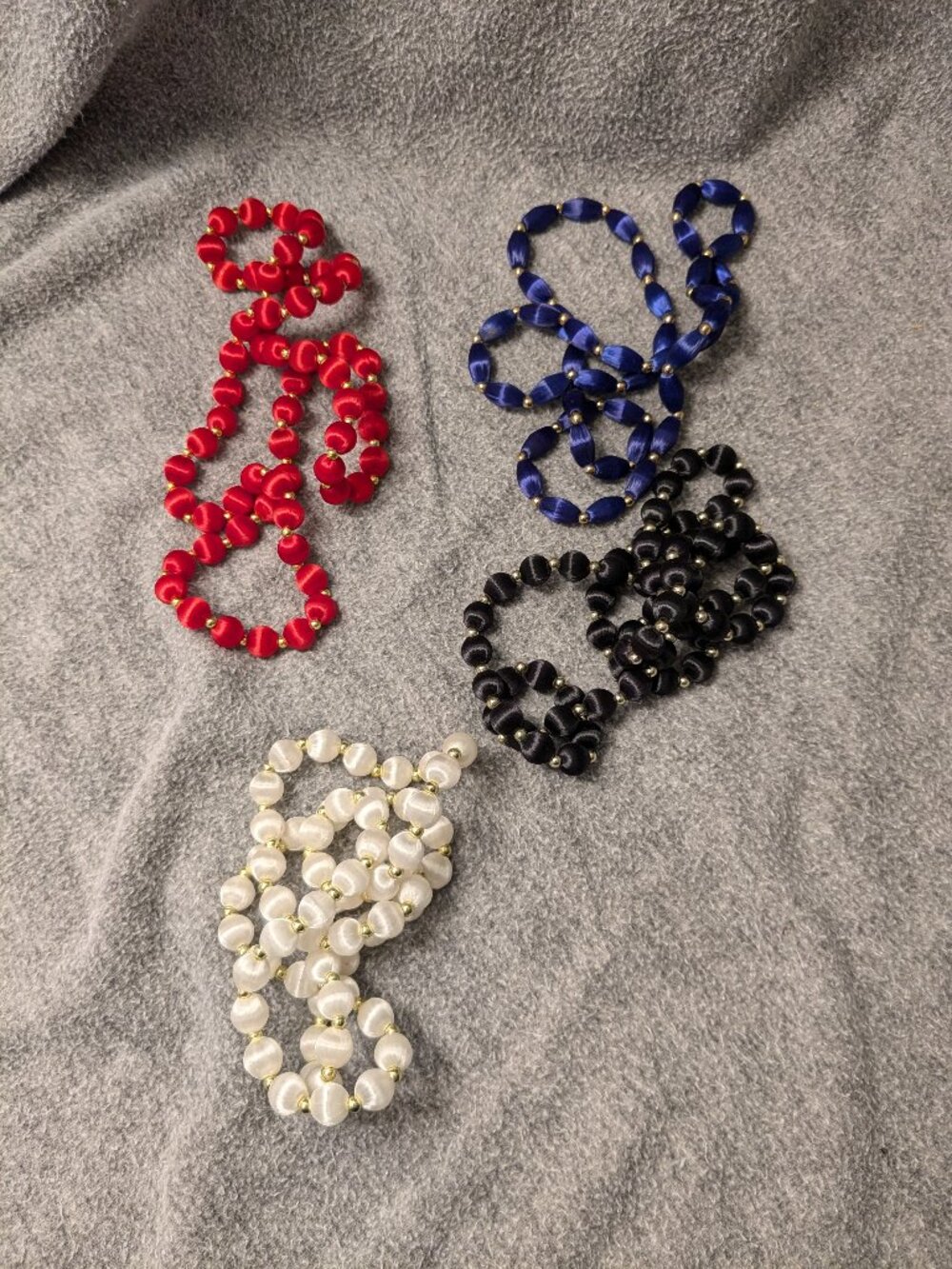 Four Vintage Silk Bead Necklaces Black, Red, White, Blue